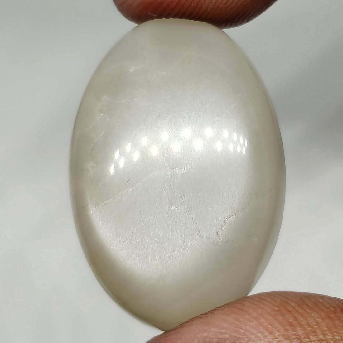 24.35 ct Top Grade Natural Grey Moonstone: All the stones listed are 100% natural and rarely selected from a big quantity lot also these are of very high quality. BID WITH CONFIDENCE!!! DIMENSIONS : 26X18X6 mm