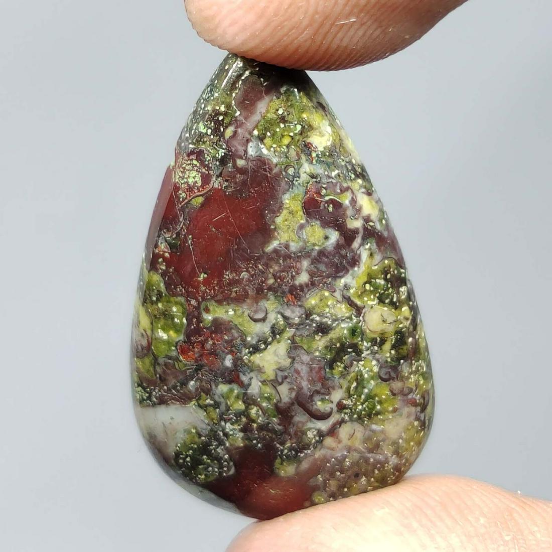 20.50 ct Top Grade Natural Dragon Jasper: All the stones listed are 100% natural and rarely selected from a big quantity lot also these are of very high quality. BID WITH CONFIDENCE!!! DIMENSIONS : 30X17X4 mm