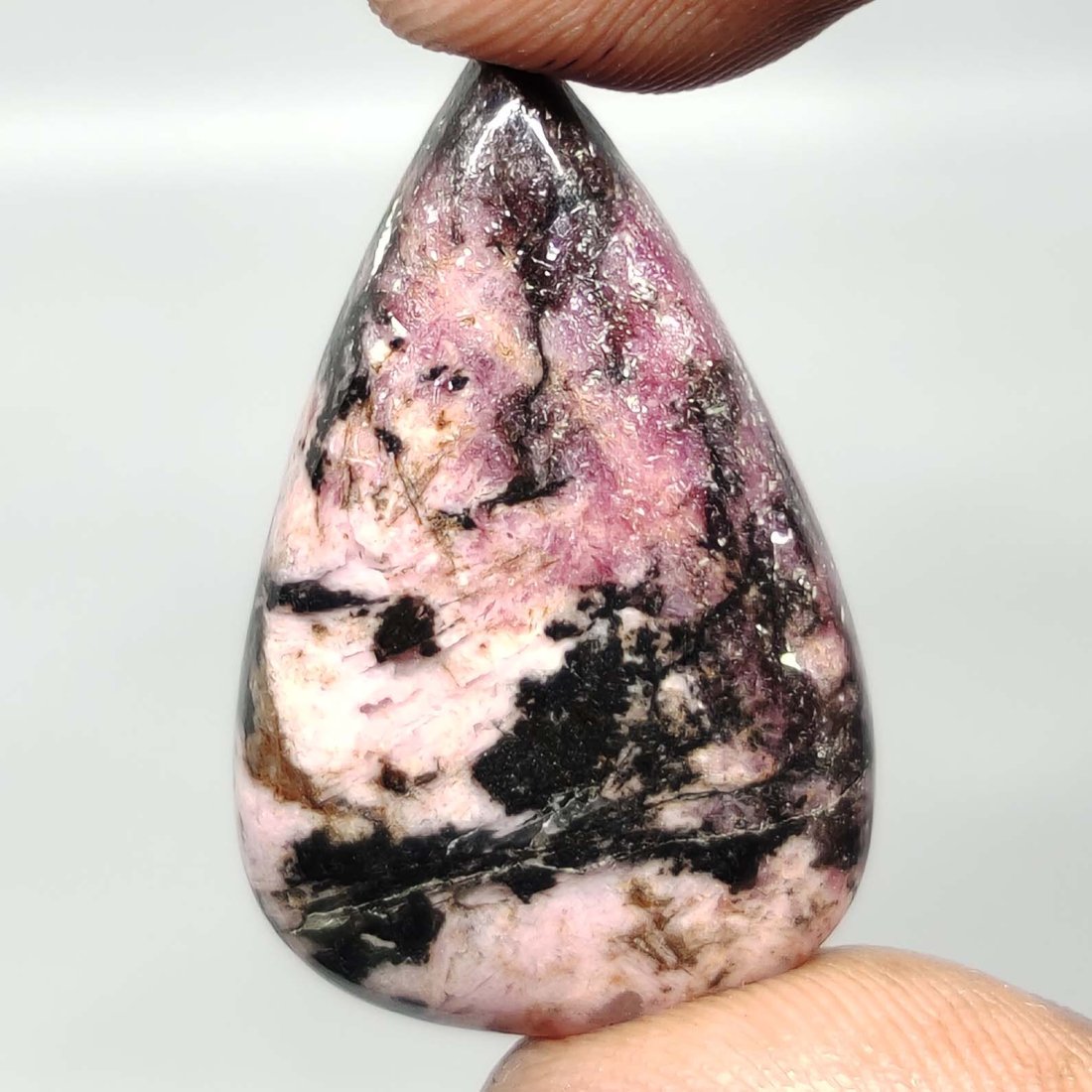 37.15 ct Natural Rhodonite Jasper: All the stones listed are 100% natural and rarely selected from a big quantity lot also these are of very high quality. BID WITH CONFIDENCE!!! DIMENSIONS : 30X19X6 mm