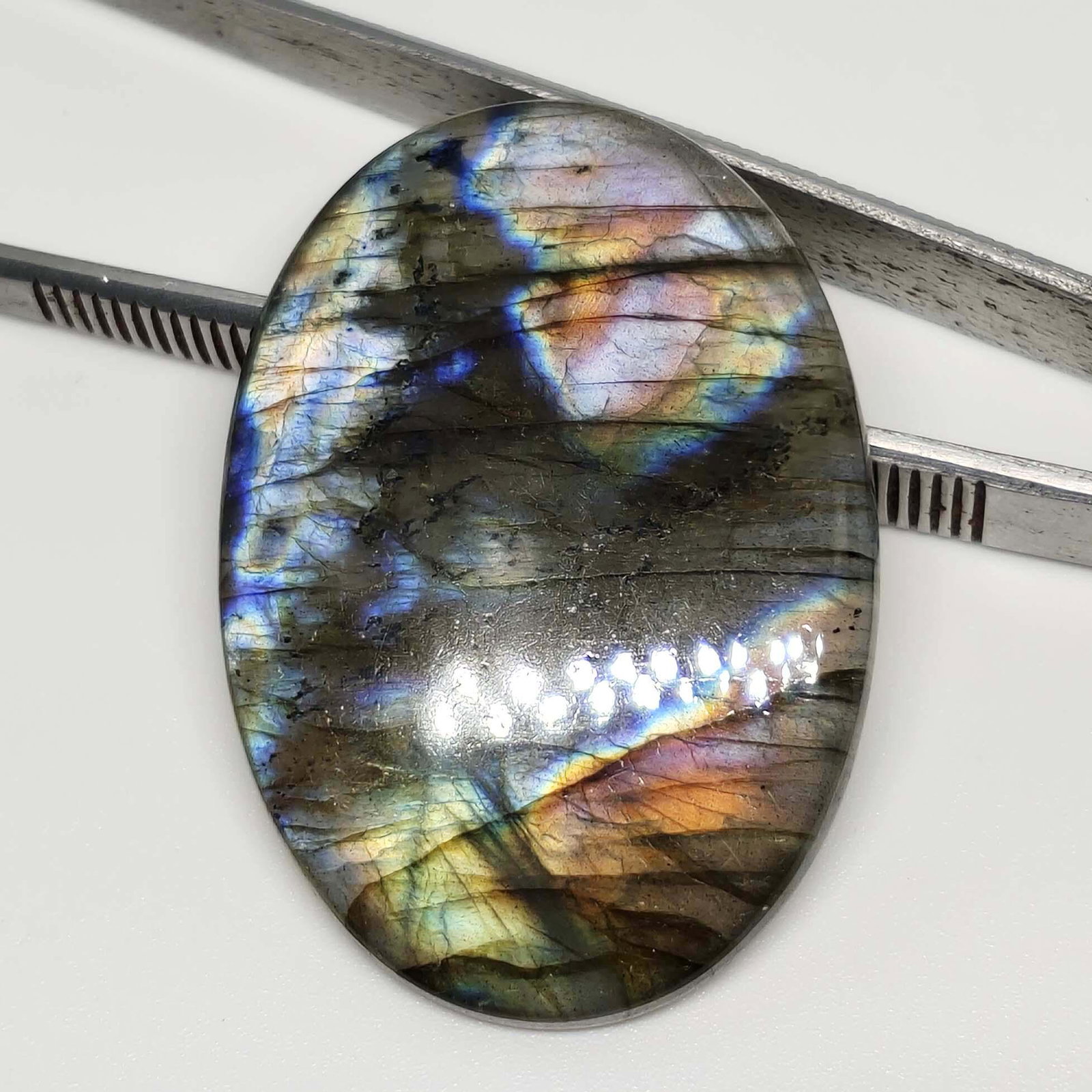 72.20 ct Natural Labradorite: All the stones listed are 100% natural and rarely selected from a big quantity lot also these are of very high quality. BID WITH CONFIDENCE!!! DIMENSIONS : 45X32X5 mm