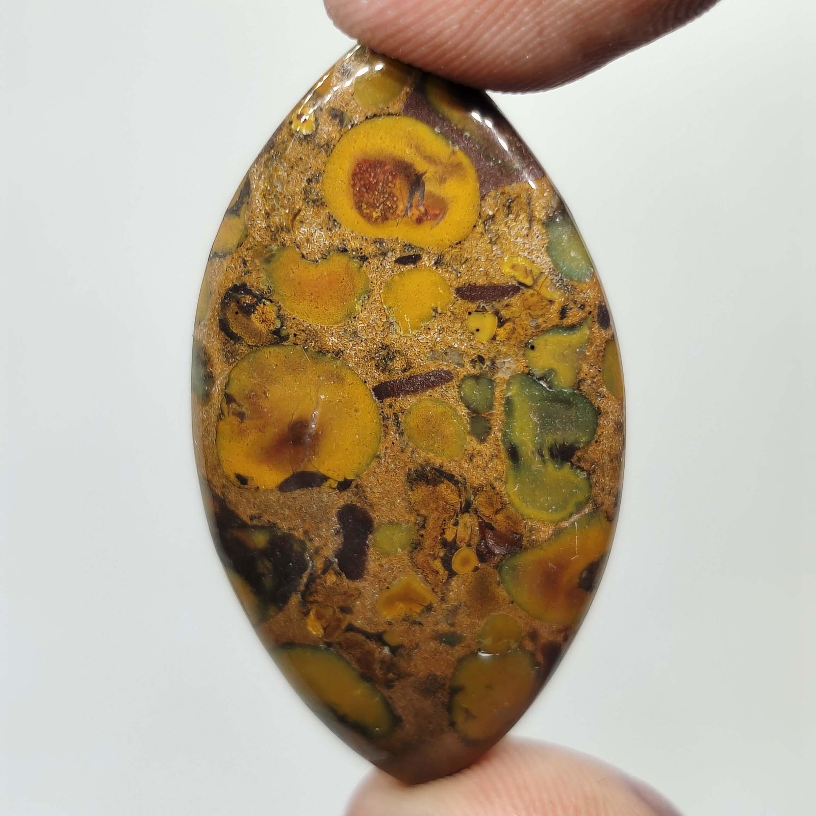 46.10 ct Top Grade Natural Fruit Jasper: All the stones listed are 100% natural and rarely selected from a big quantity lot also these are of very high quality. BID WITH CONFIDENCE!!! DIMENSIONS : 43X23X5 mm