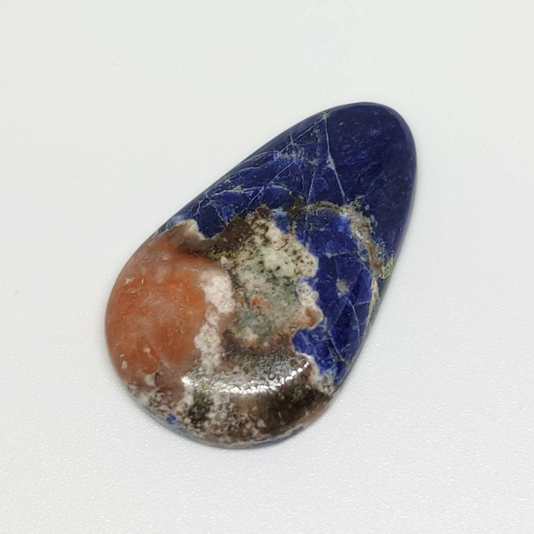 28.25 ct Natural Sodalite: All the stones listed are 100% natural and rarely selected from a big quantity lot also these are of very high quality. BID WITH CONFIDENCE!!! DIMENSIONS : 35X22X5 mm