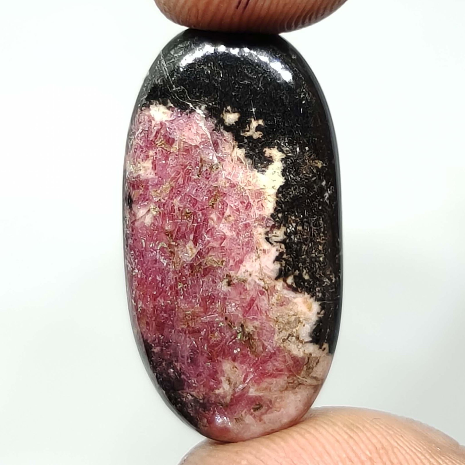 24.30 ct Natural Rhodonite Jasper: All the stones listed are 100% natural and rarely selected from a big quantity lot also these are of very high quality. BID WITH CONFIDENCE!!! DIMENSIONS : 29X14X4 mm