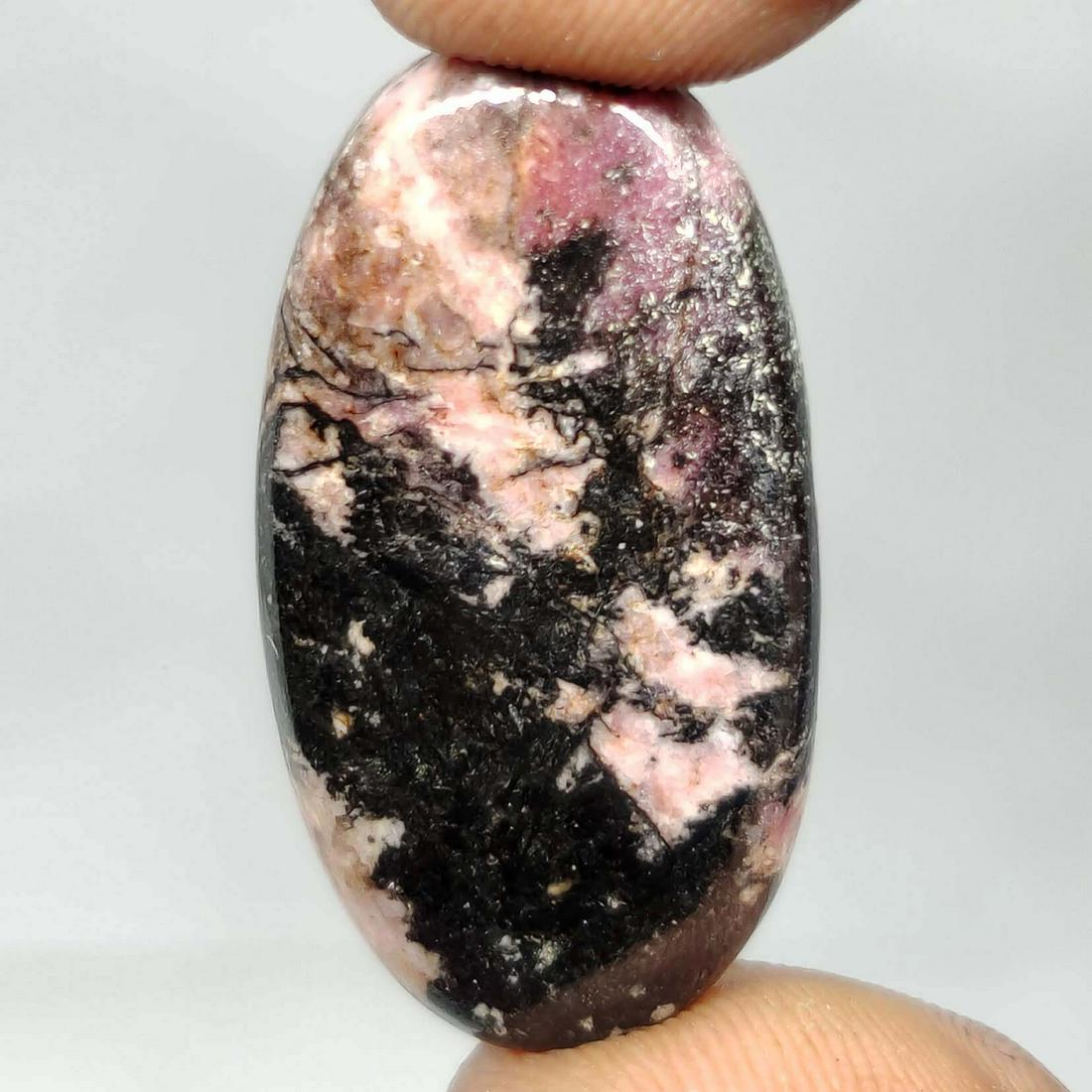 33.10 ct Natural Rhodonite Jasper: All the stones listed are 100% natural and rarely selected from a big quantity lot also these are of very high quality. BID WITH CONFIDENCE!!! DIMENSIONS : 33X17X5 mm