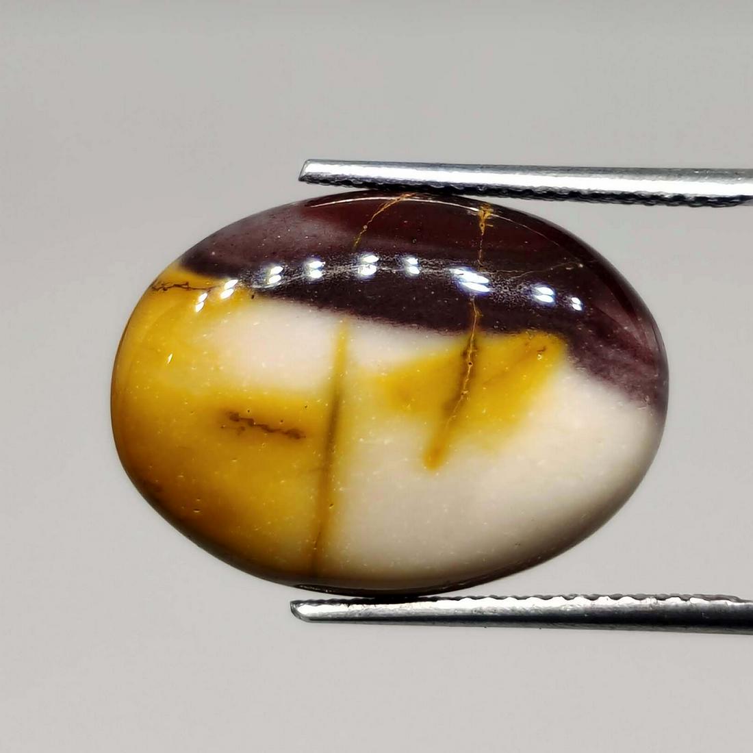 11.00 ct Natural Mookaite Jasper: All the stones listed are 100% natural and rarely selected from a big quantity lot also these are of very high quality. BID WITH CONFIDENCE!!! DIMENSIONS : 19X14X4 mm