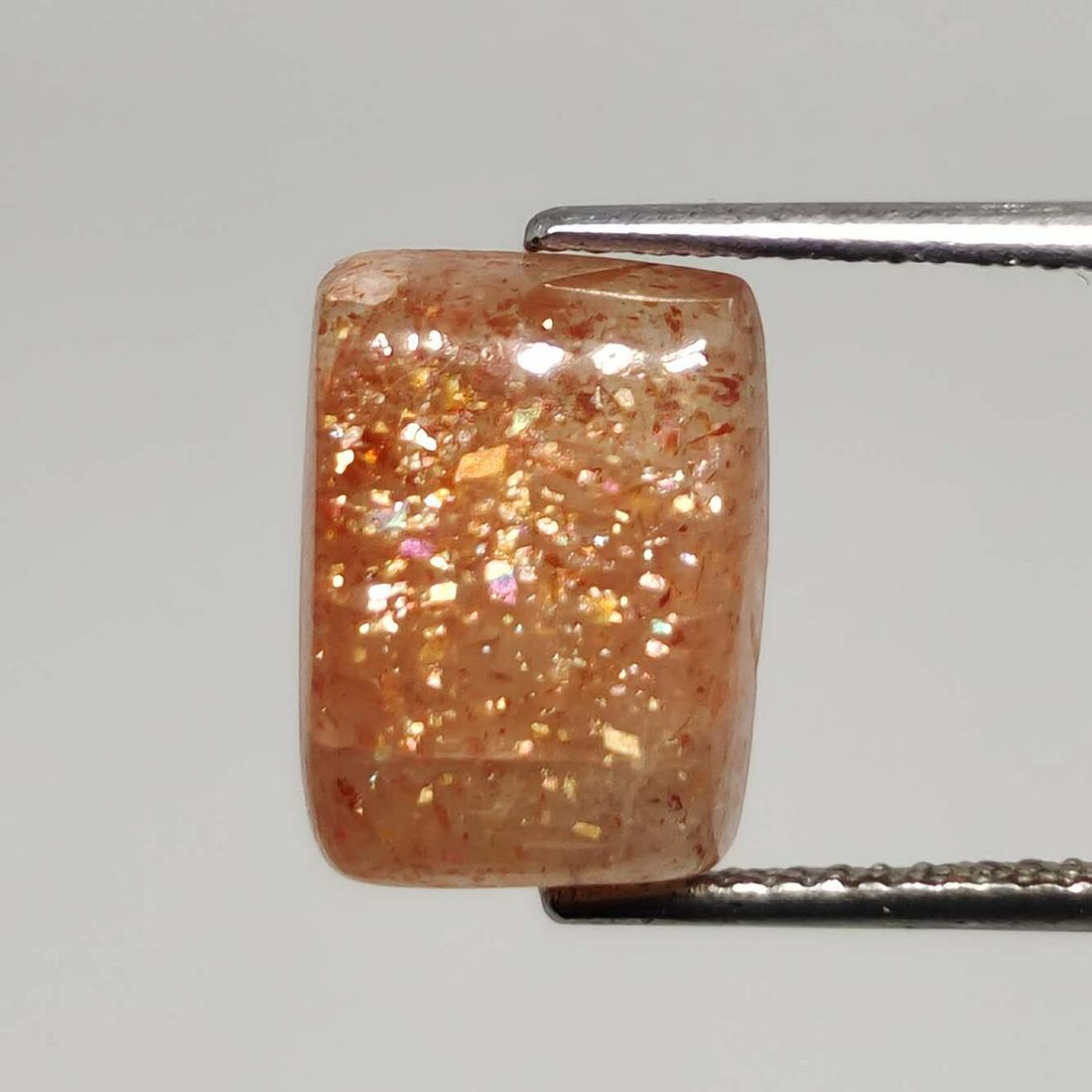 4.55 ct Natural Sunstone: Gemstones: SunstoneCarat Weights: 4.55 ct Size/Dimensions: 12 x 9 x 4.6 mm
