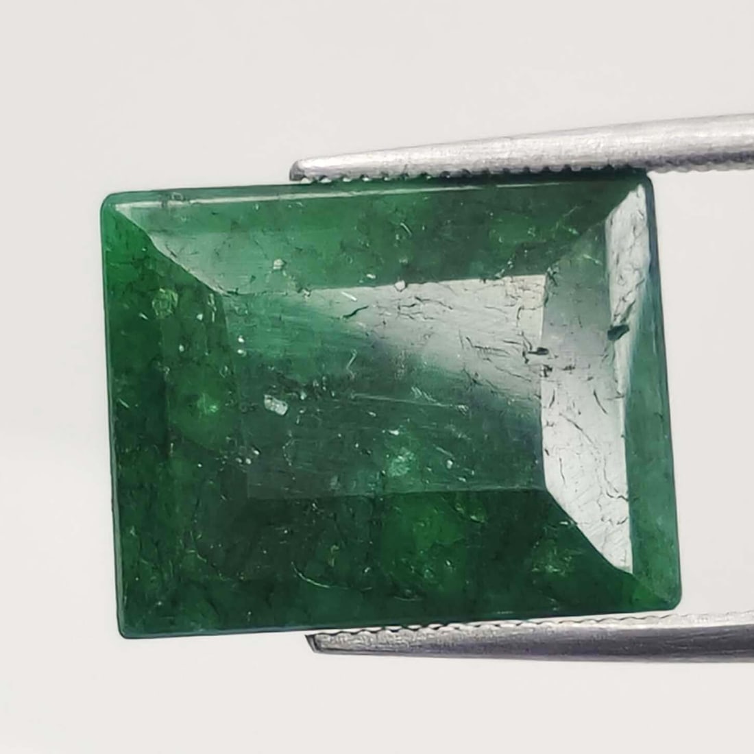 17.20 ct Natural Coated Emerald: Gemstones: Natural EmeraldCarat Weights: 17.20 ct Size/Dimensions: 16.60 X 13.30 X 7 mm ApproxTreatment : Coated
