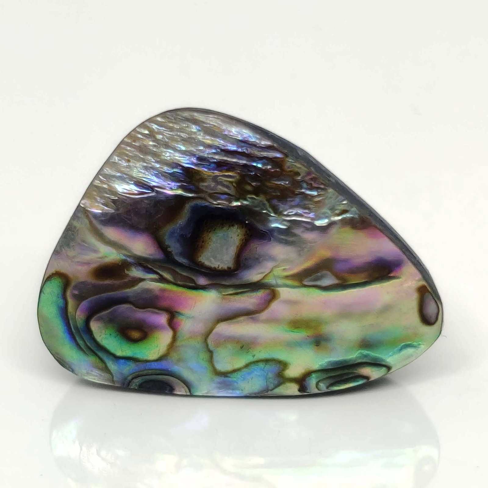 21 ct Natural Australian Abalone Shell: Gemstones: Natural Abalone ShellCarat Weights: 21 ct Size/Dimensions: 28 X 20 X 5 mm
