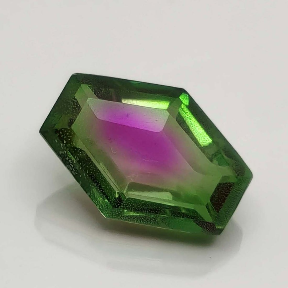 5.65 Ct "Beautiful" Watermelon Triplet Quartz Fancy Cut: Gemstones: Triplet QuartzCarat Weights: 5.65 ct Size/Dimensions: 14 X 10 mmTreatment: Made of two natural quartzAbout Stone: We have created two pieces of natural clear quartz. To create a triplet, we