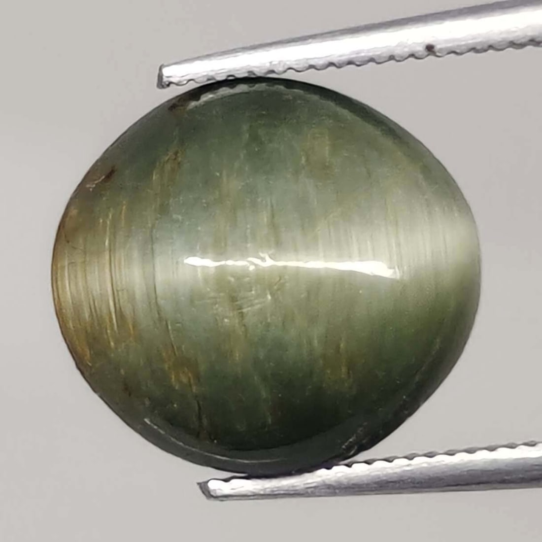 7.50 ct Natural Cat's Eye: Gemstones: Natural Cat's EyeCarat Weights: 7.50 ct Size/Dimensions: 12.60 X 7.60 X 7.50 mm ApproxTreatment: No