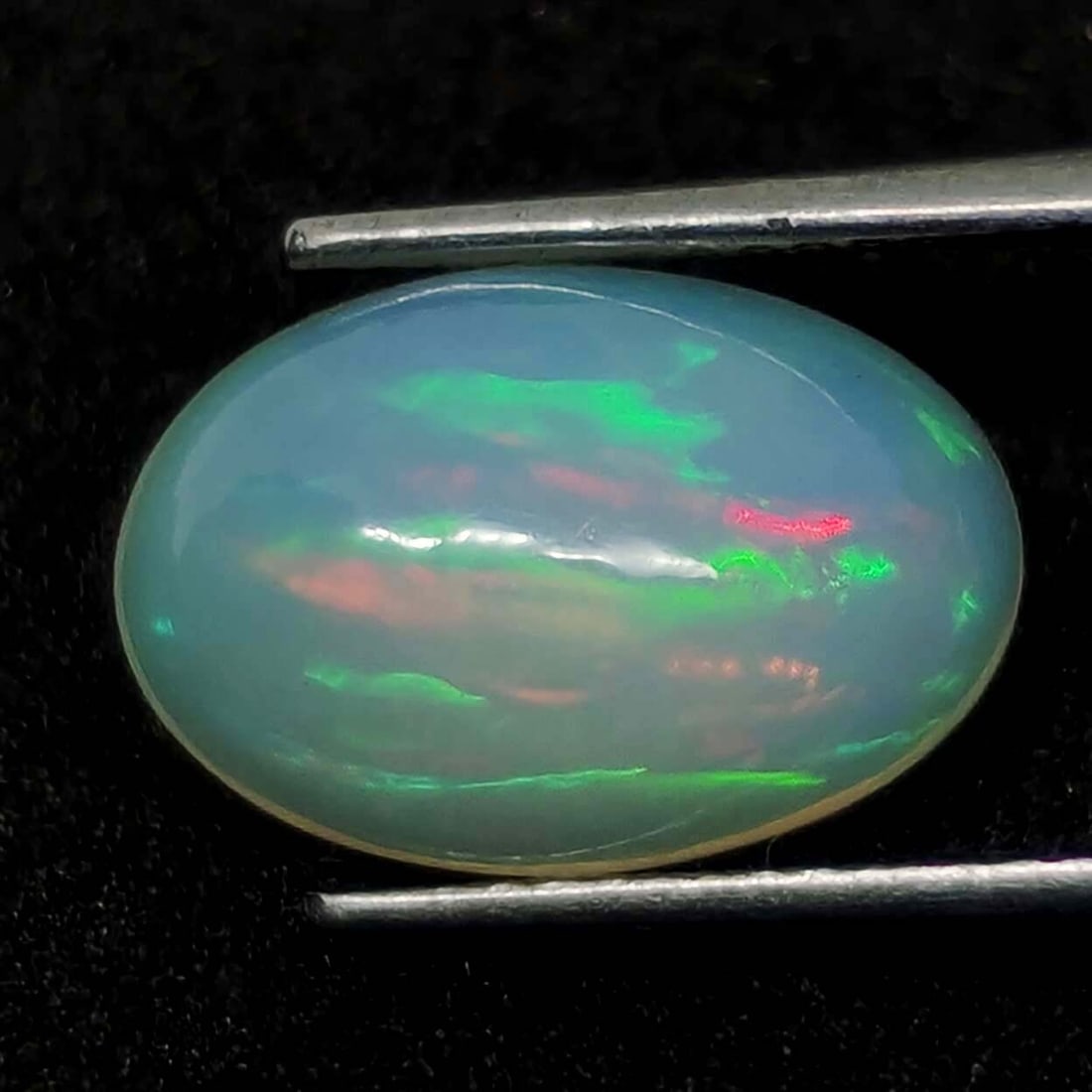 3.10 ct Natural Ethiopian Fire Opal: Gemstones: Ethiopian OpalCarat Weights: 3.10 ct Size/Dimensions: 12.6 X 8.6 X 5.70 mm