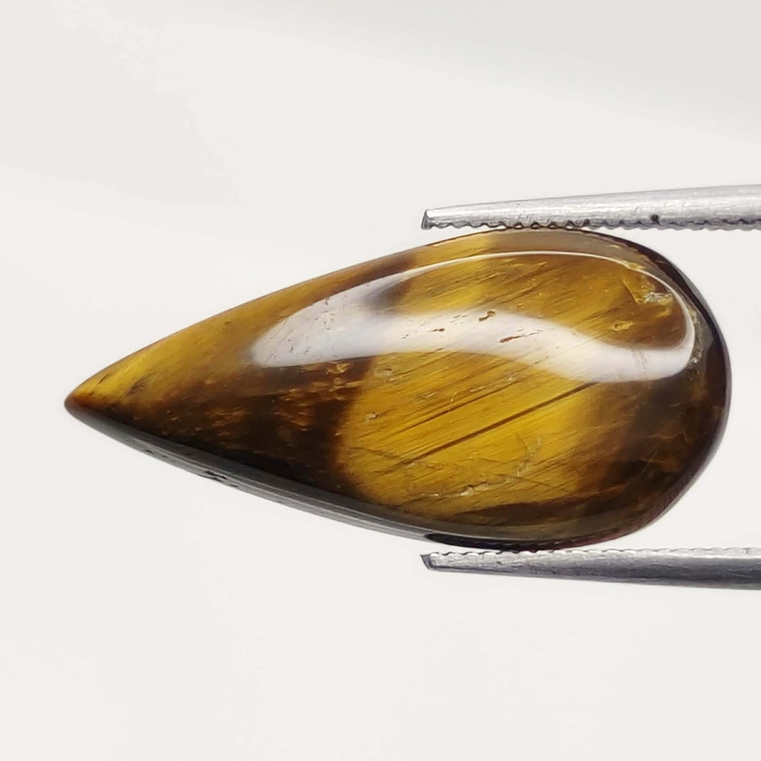 8.95 Ct Natural Golden Tiger's Eye: Gemstones: Natural Tiger's Eye /Carat Weights: 8.95 ct /Size or Dimensions: 23.20 X 11.30 X 4.70 mm /Treatment: No