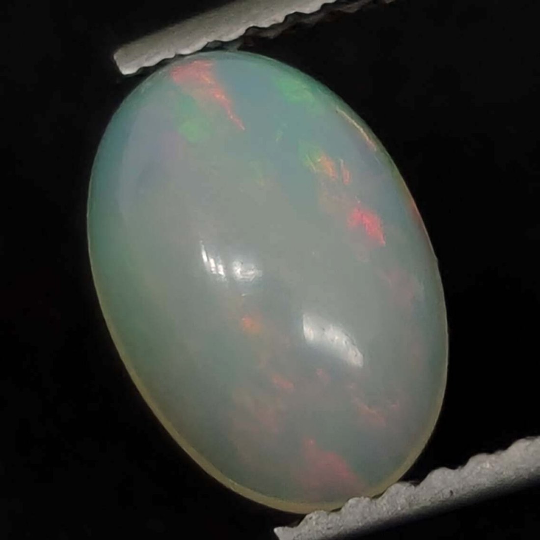 1.00 Ct Natural Ethiopian Fire Opal: Gemstones: Natural Fire Opal /Carat Weights: 1 ct /Size or Dimensions: 9.60 X 6.60 X 3.40 mm /Treatment: None