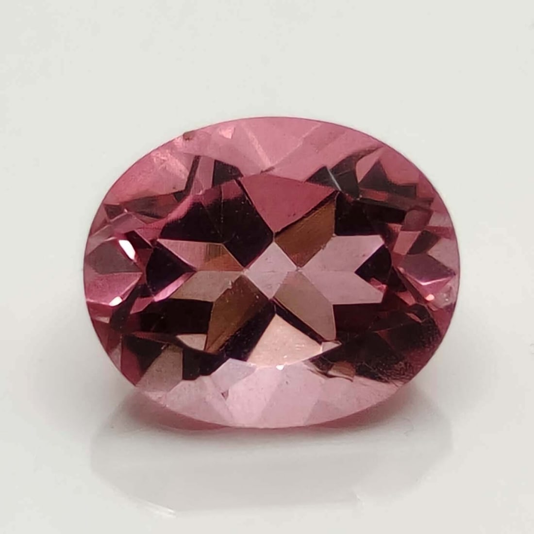 5.10 ct Natural Morganite Color Mystic Quartz: Gemstones: Natural Mystic QuartzCarat Weights: 5.10 ct Size/Dimensions: 12 X 10 X 7 mmTreatment: Coated