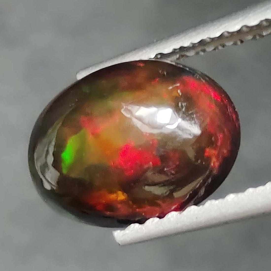 1.50 Ct "Play Of Colors" Natural Black Opal (1 of 3)
