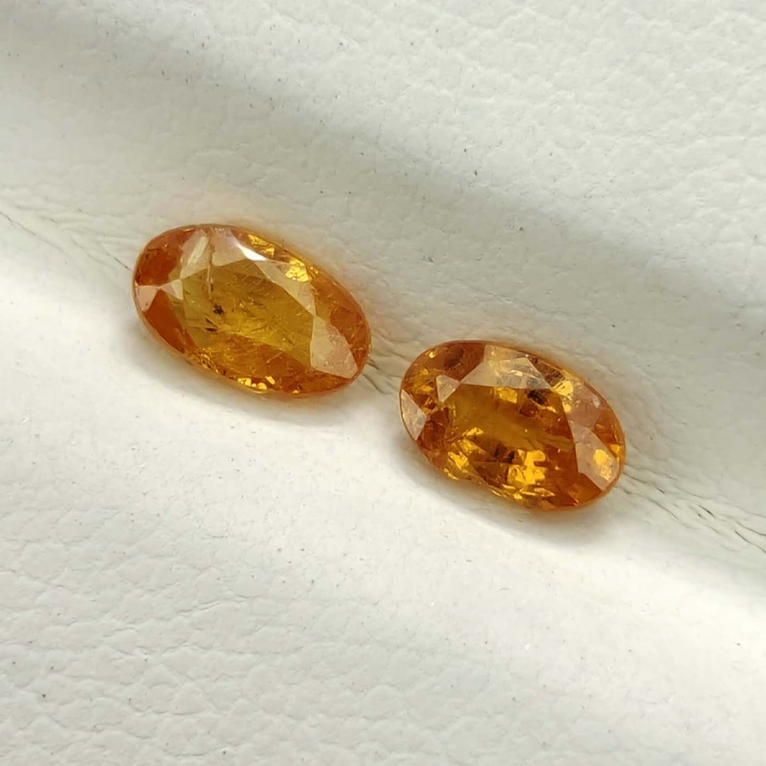0.68 Ct "Fanta Orange" Natural Spessartite Garnet Pair: Gemstones: Natural Spessartite Garnet /Carat Weights: 0.68 ct /Size/Dimensions: 5 X 3 mm /Treatment: None