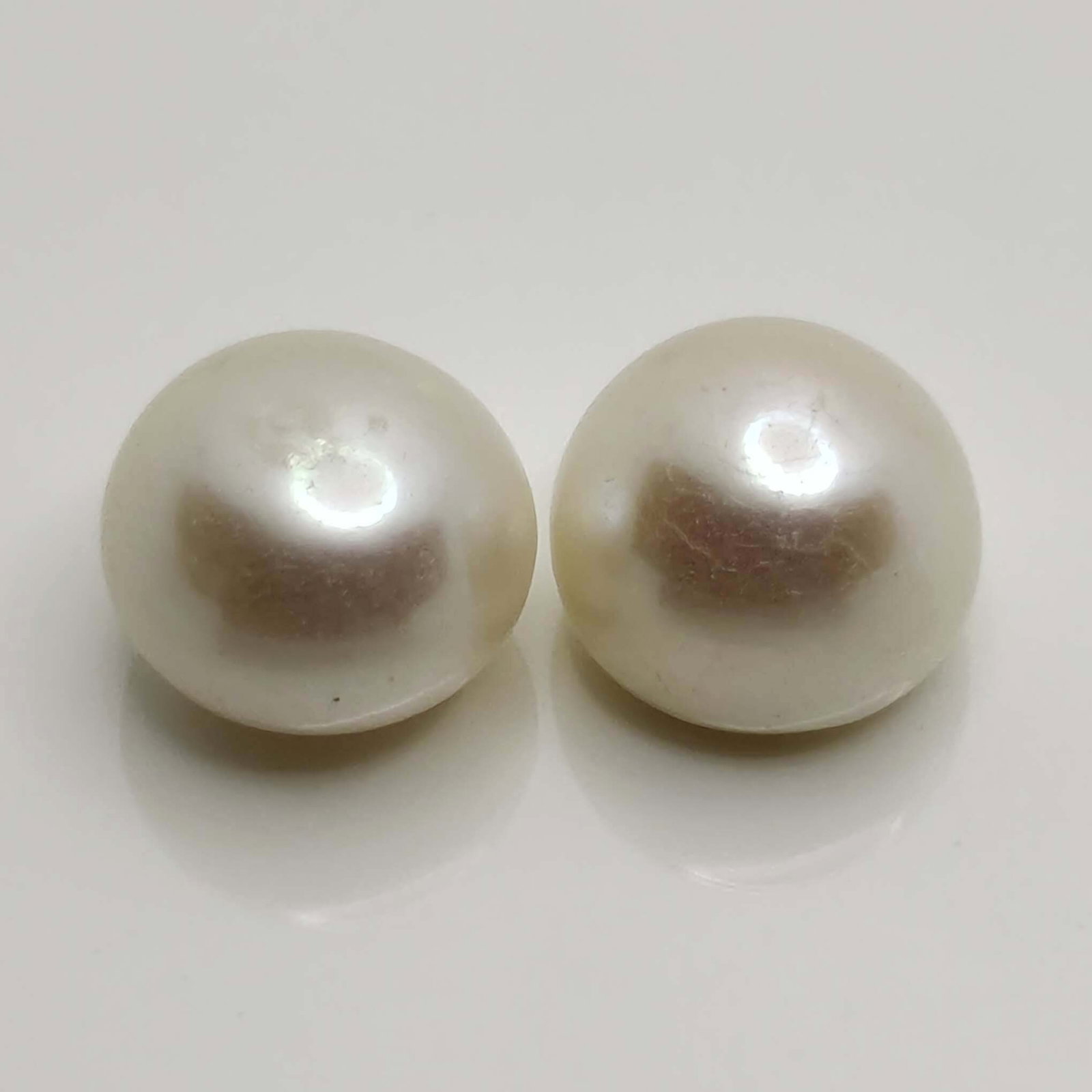 11.45 Ct Natural Fresh Water Pearl Pair: Gemstones: Natural Fresh Water PearlCarat Weights: 11.45 ct Size/Dimensions: 10 X 10 mmOrigin: IndiaTreatment: None