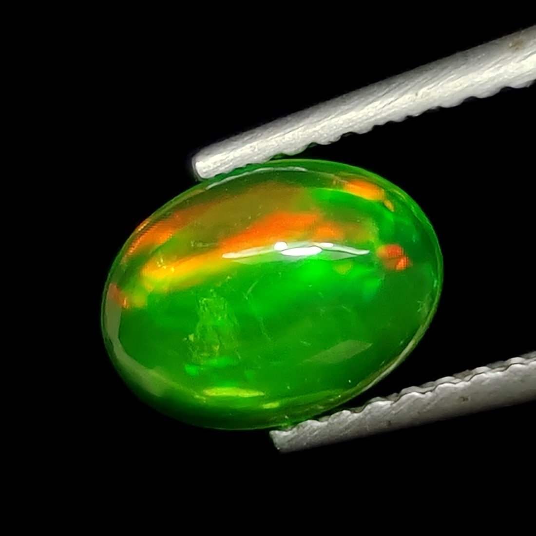 0.80 Ct Natural Green Fire Opal: Gemstones: Natural Green Fire Opal /Carat Weights: 0.80 ct /Size or Dimensions: 8 X 6 X 3.40 mm /Treatment: Coated