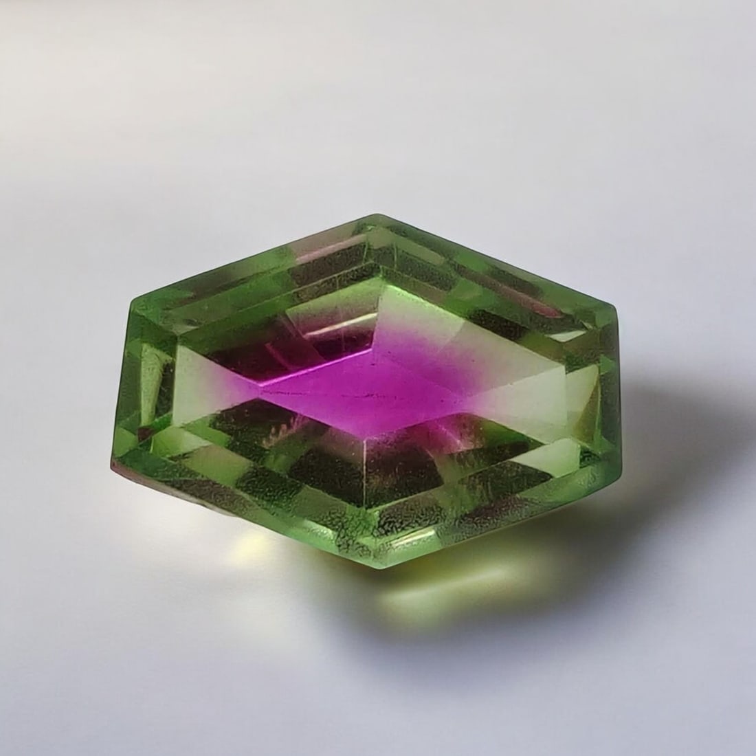 5.60 Ct "Beautiful" Watermelon Triplet Quartz Fancy Cut: Gemstones: Triplet QuartzCarat Weights: 5.60 ct Size/Dimensions: 14 X 10 mmTreatment: Made of two natural quartzAbout Stone: We have created two pieces of natural clear quartz. To create a triplet, we