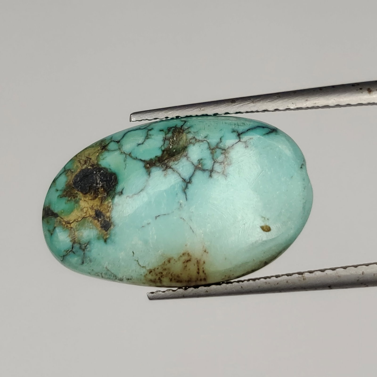 9.07 ct Natural Tibetan Turquoise: Gemstones: Natual Tibetan Turquoise /Carat Weights: 9.07 ct /Size or Dimensions: 21.14 X 13.30 X 4.10 mm
