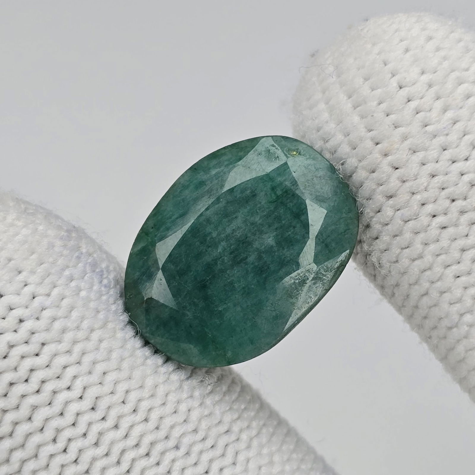 11.06 ct Natural Coated Emerald: Gemstones: Natural Emerald /Carat Weights: 11.06 ct /Size or Dimensions: 17 X 12.75 X 6.20 mm Approx /Treatment : Coated