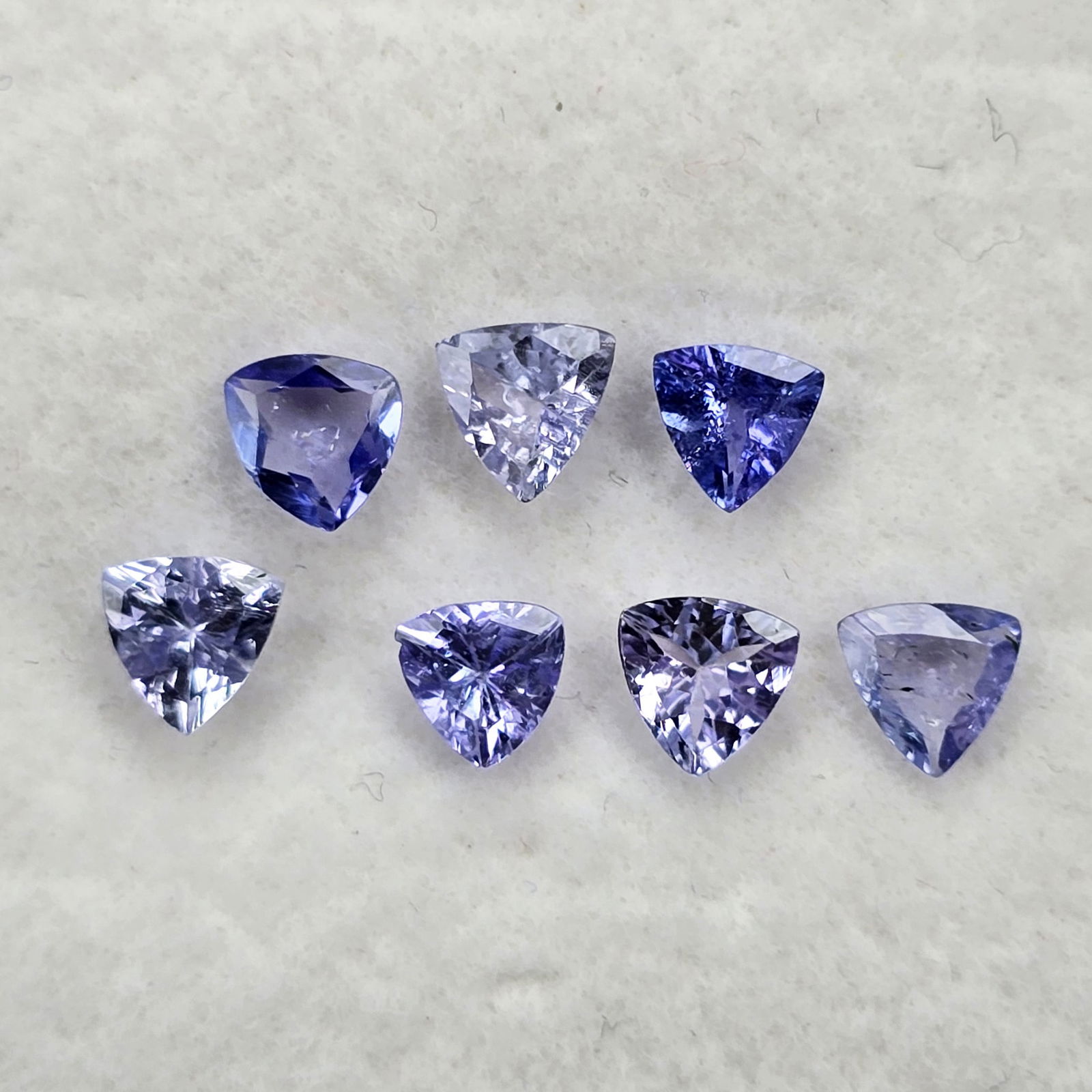 1.60 Ct Natural Tanzanite Trillion Set: Gemstones: Natural Tanzanite /Carat Weights: 1.60 ct /Size or Dimensions: 4 mm /Origin : Tanzania