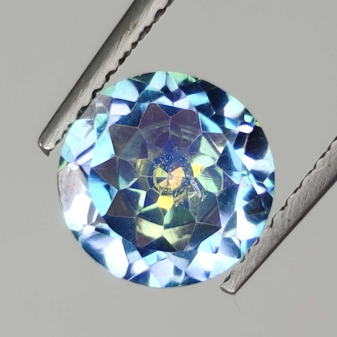 1.78 ct Natural "Sparkling" Beyond Elitism Quartz: Gemstones: Natural Mystic Quartz /Carat Weights: 1.78 ct /Size or Dimensions: 8 X 8 mm /Treatment: Coated