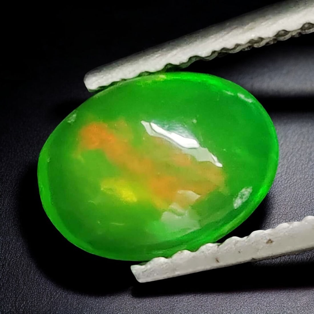 0.70 Ct Natural Green Fire Opal: Gemstones: Natural Green Fire Opal /Carat Weights: 0.70 ct /Size or Dimensions: 8 X 6 mm /Treatment: Coated