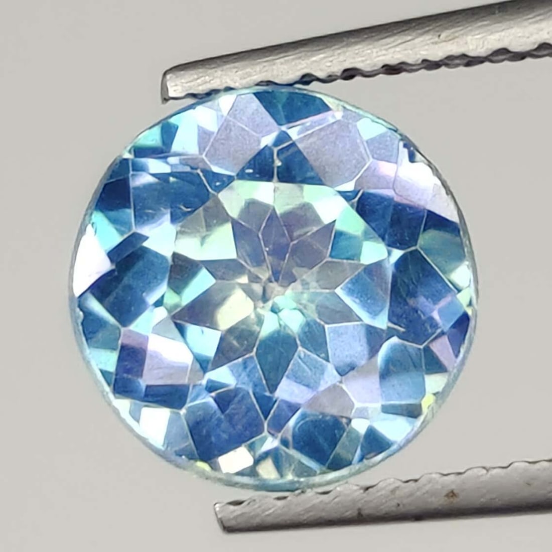 2.44 ct Natural "Sparkling" Beyond Elitism Quartz: Gemstones: Natural Mystic Quartz /Carat Weights: 2.44 ct /Size or Dimensions: 8 X 8 mm /Treatment: Coated