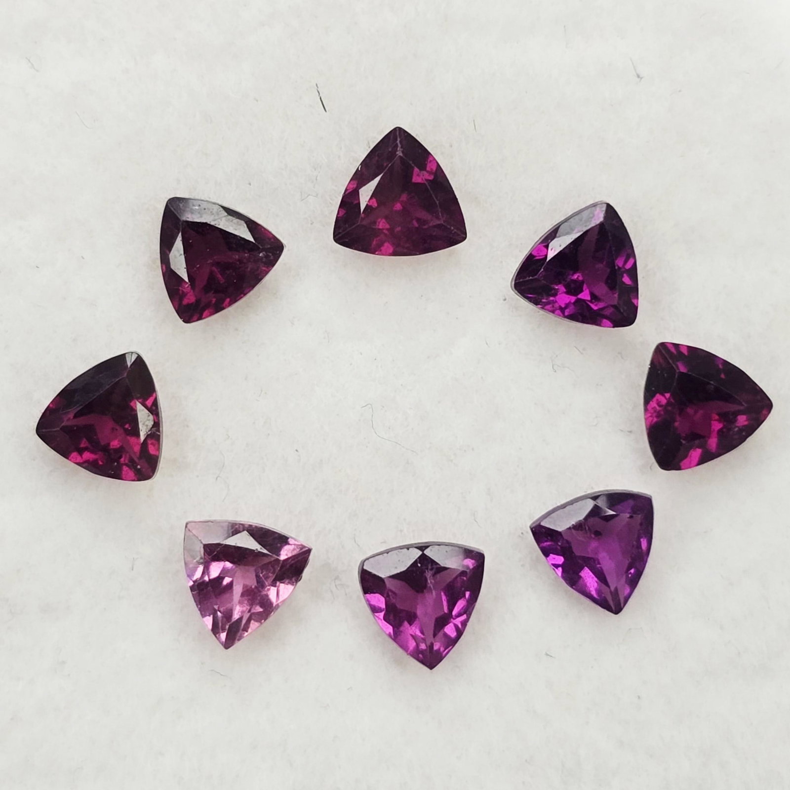 2.54 Ct Natural Rhodolite Garnet Trillion Set: Gemstones: Rhodolite Garnet /Carat Weights: 2.54 ct /Size or Dimensions: 4 mm /