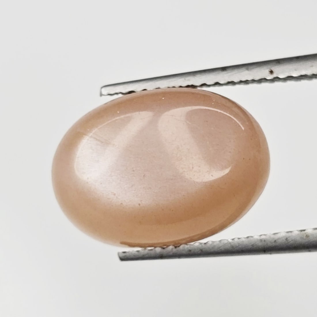 6.74 ct Natural Peach Moonstone: Gemstones: Natural Moonstone /Carat Weights: 6.74 ct /Size or Dimensions: 14.10 X 10.10 X 5.80 mm Approx