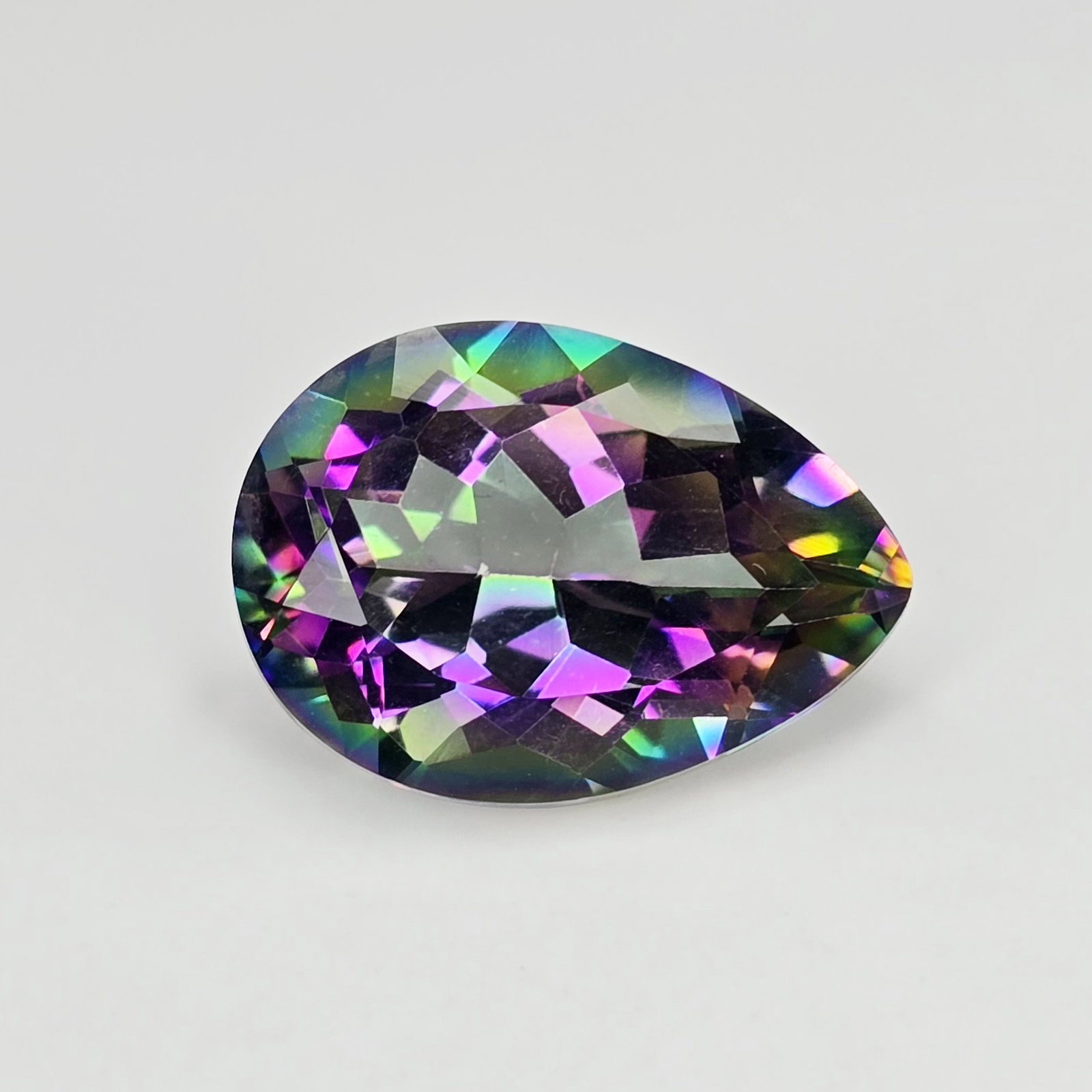 21.40 ct "Top Qulaity" Natural Rainbow Mystic Quartz: Gemstones: Natural Mystic Quartz /Carat Weights: 21.40 ct /Size or Dimensions: 22.20 X 16 X 11.20 mm /Treatment: Coated