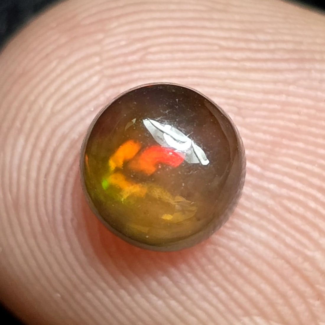 0.76 Ct "Play Of Colors" Natural Black Opal (1 of 3)