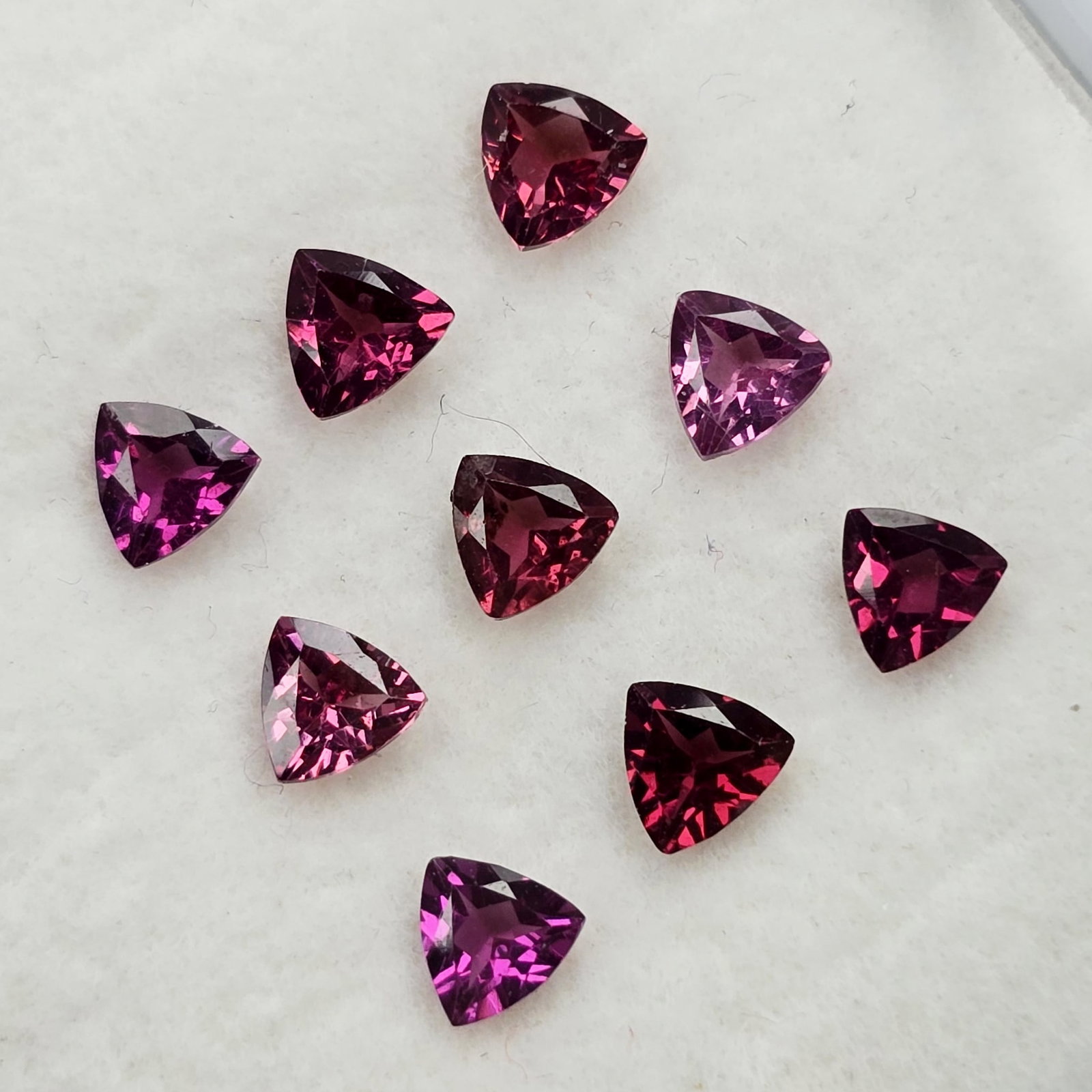 2.31 Ct Natural Rose Garnet Trillion Set: Gemstones: Rose Garnet /Carat Weights: 2.31 ct /Size or Dimensions: 4 mm
