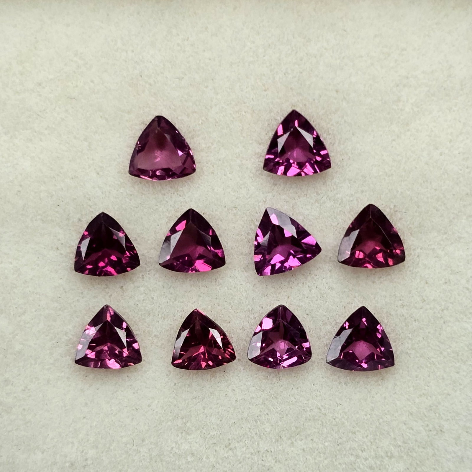 2.49 Ct Natural Rose Garnet Trillion Set: Gemstones: Rose Garnet /Carat Weights: 2.49 ct /Size or Dimensions: 4 mm
