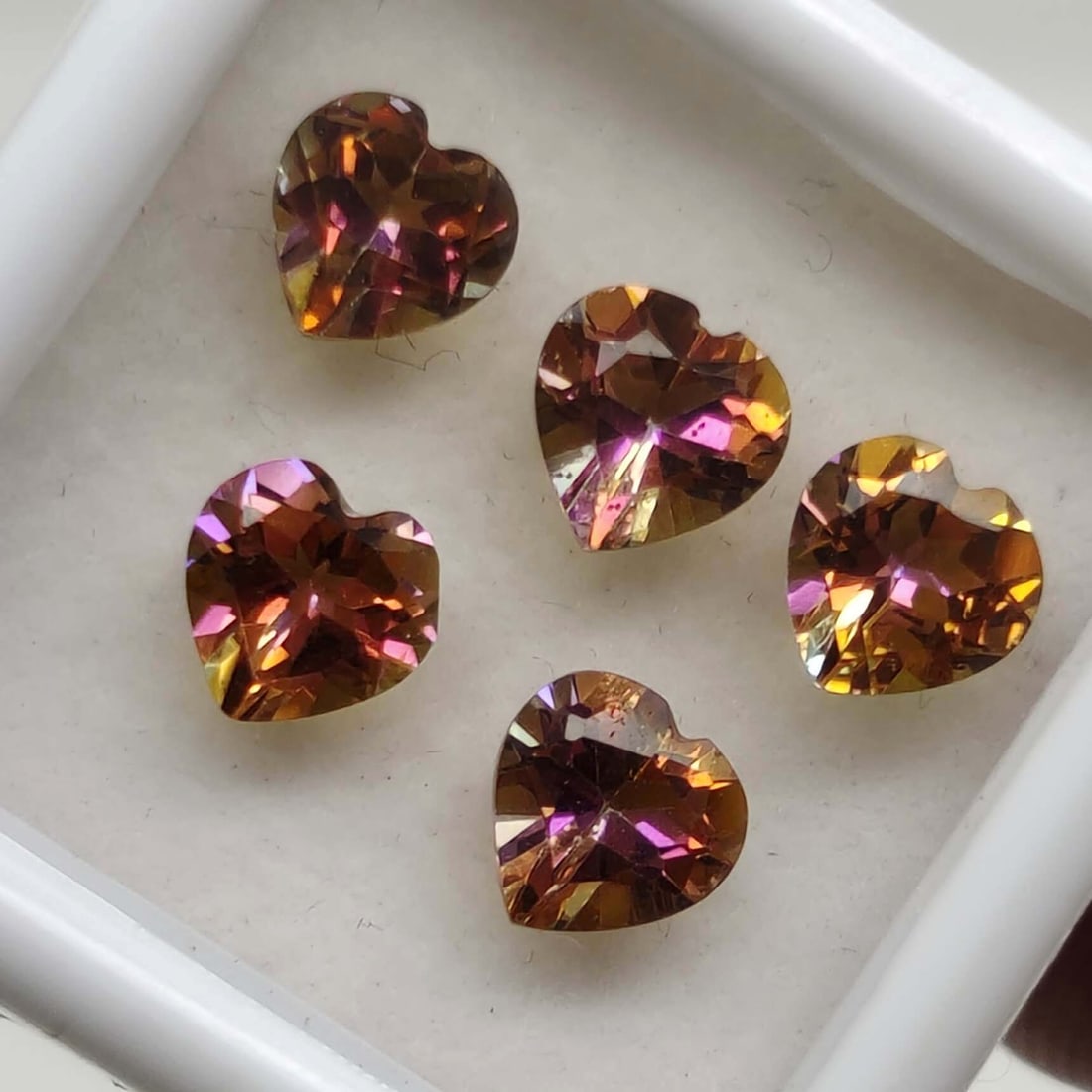 4.45 ct Rare Natural Ecstasy Mystic Topaz Set: Gemstones: Natural Mystic TopazCarat Weights: 4.45 ct Size/Dimensions: 6 X 6 mmTreatment: Coated