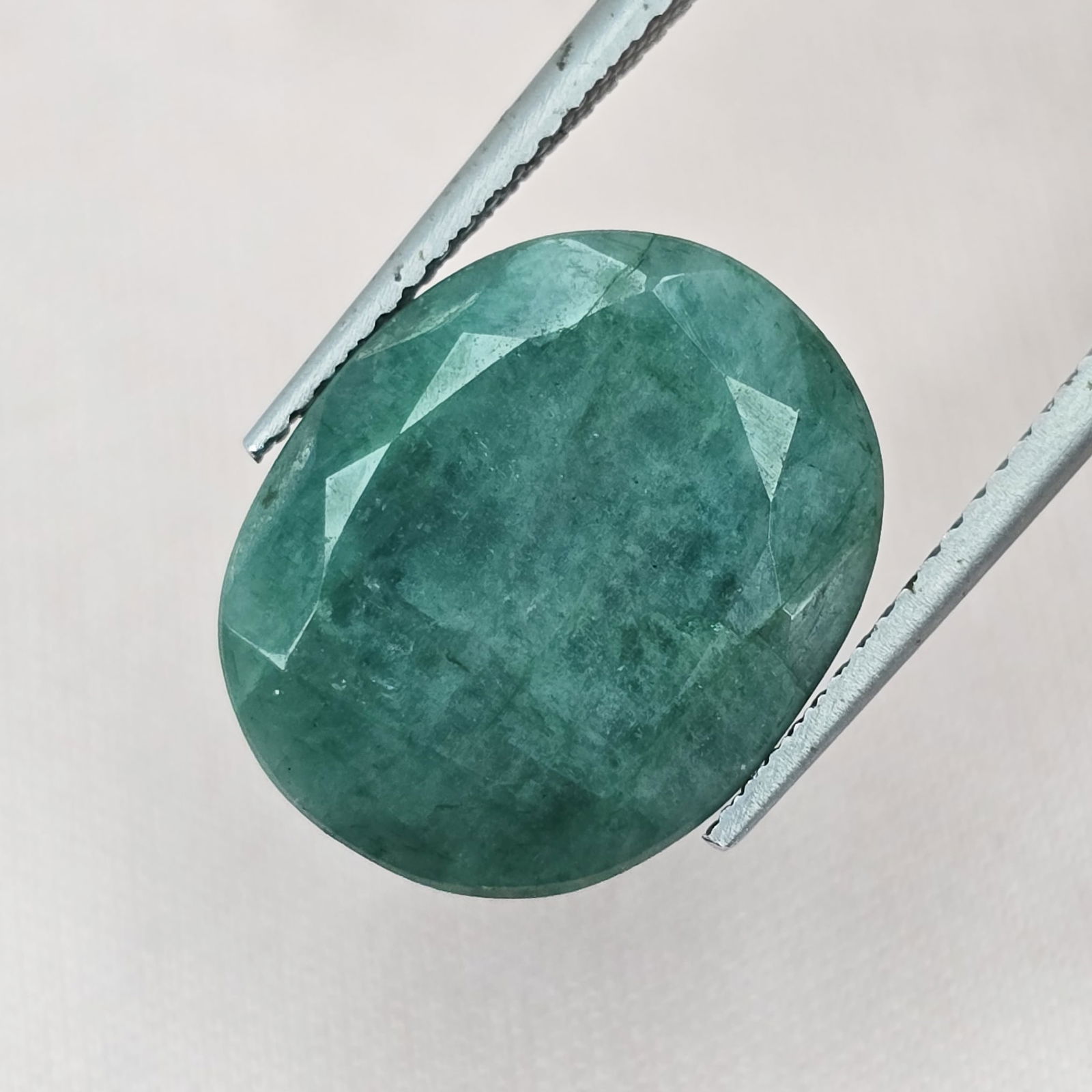 13.26 ct Natural Coated Emerald: Gemstones: Natural Emerald /Carat Weights: 13.26 ct /Size or Dimensions: 16 X 13.40 X 7.70 mm Approx /Treatment : Coated