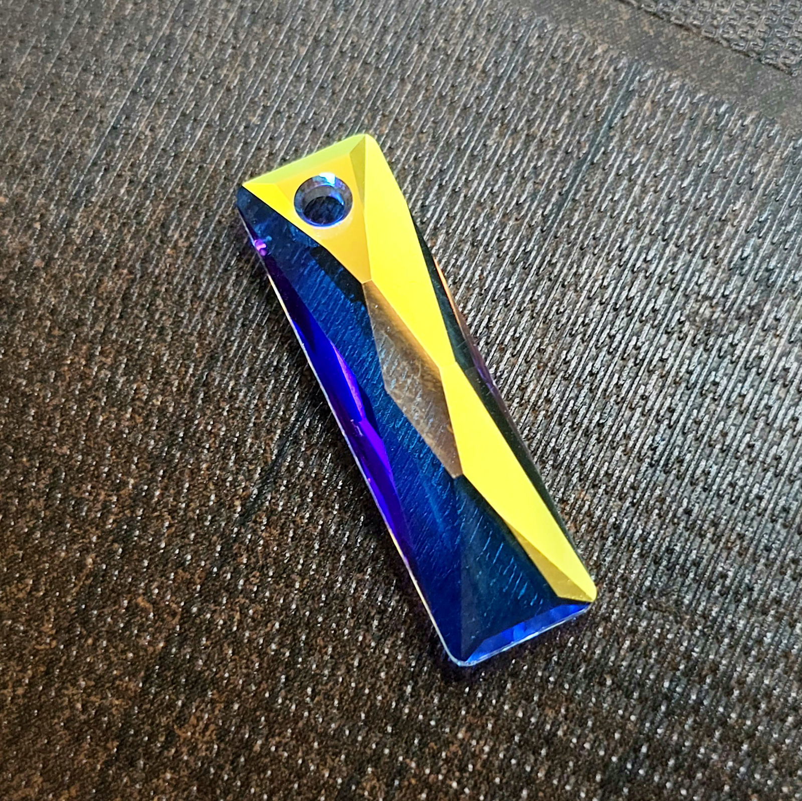 7.51 ct Natural Mercury Glow Mystic Topaz Drilled: Gemstones: Natural Mystic Topaz /Carat Weights: 7.51 ct /Size or Dimensions: 25 X 7.30 X 4.70 mm /Treatment: Coated