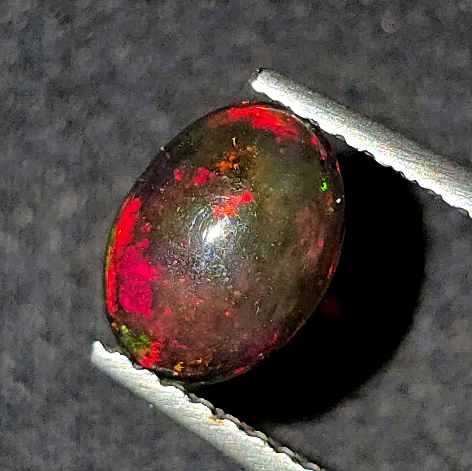 0.65 Ct "Play Of Colors" Natural Black Opal (1 of 4)