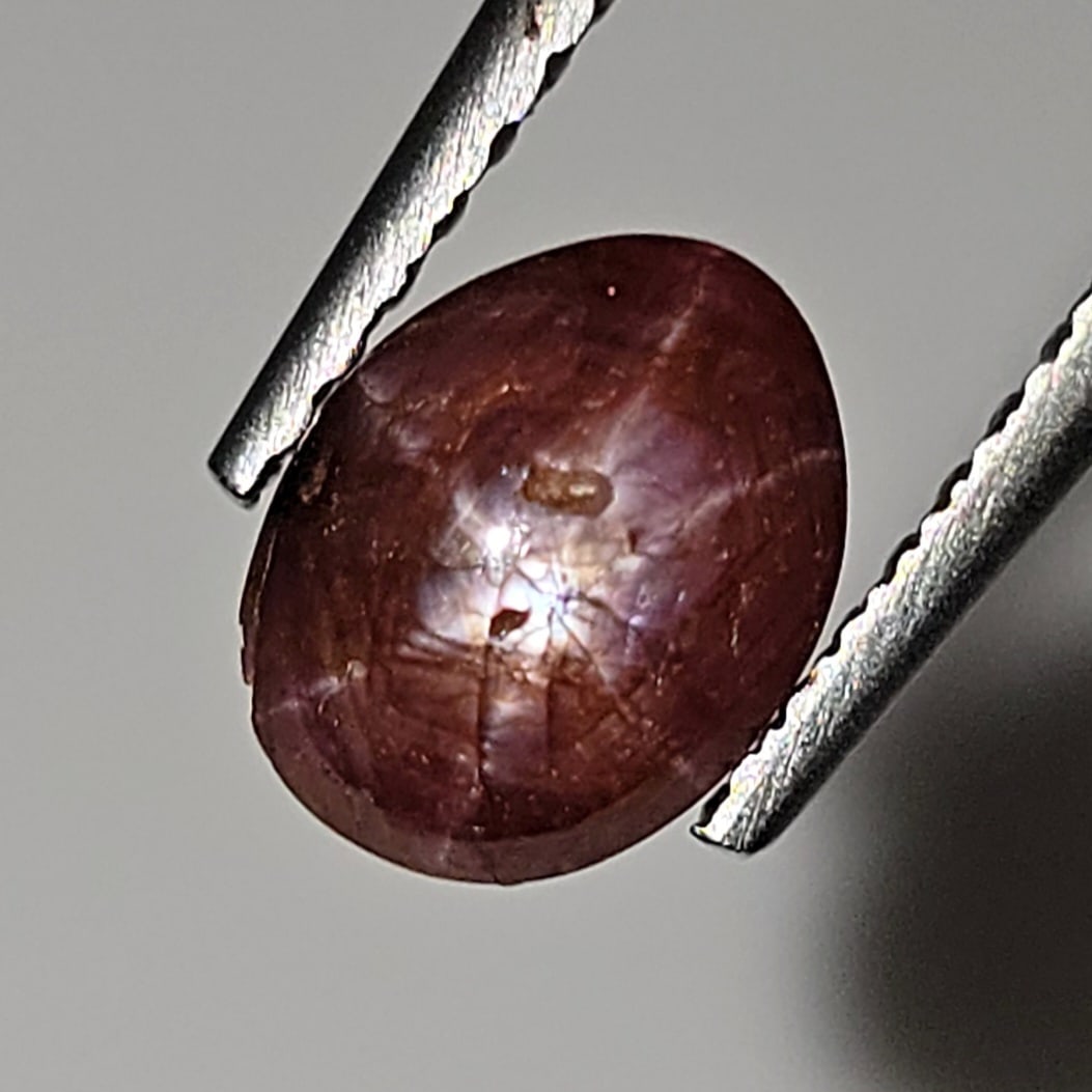 0.94 Ct Natural Star Ruby: Gemstones: Natural Sar Ruby /Carat Weights: 0.94 ct /Size or Dimensions: 7 X 5.18 X 2.66 mm /Treatment: Glass Filled