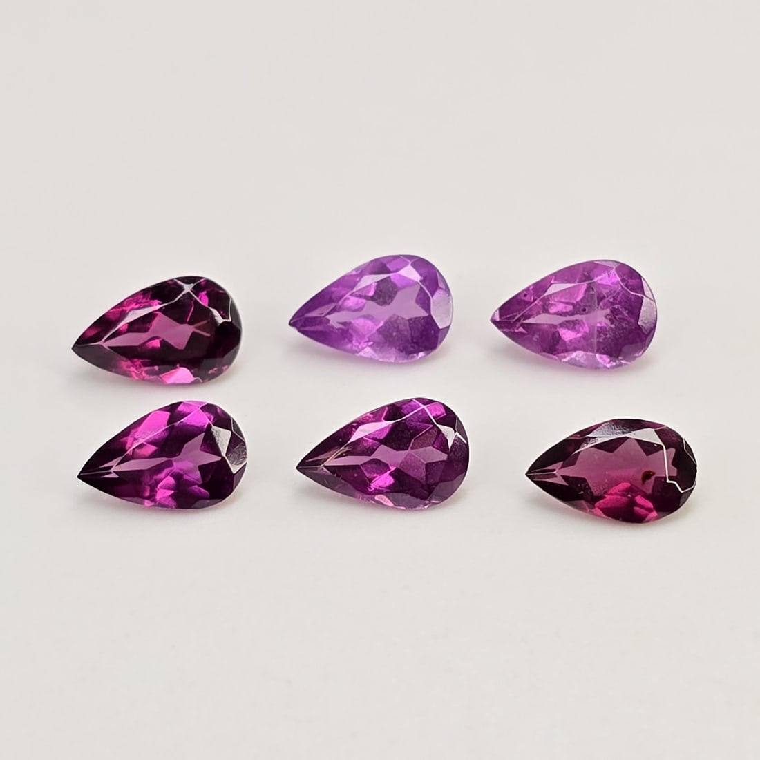 2.98 Ct Natural Rhodolite Garnet Pear Set: Gemstones: Rhodolite Garnet /Carat Weights: 2.98 ct /Size or Dimensions:6 X 45 mm