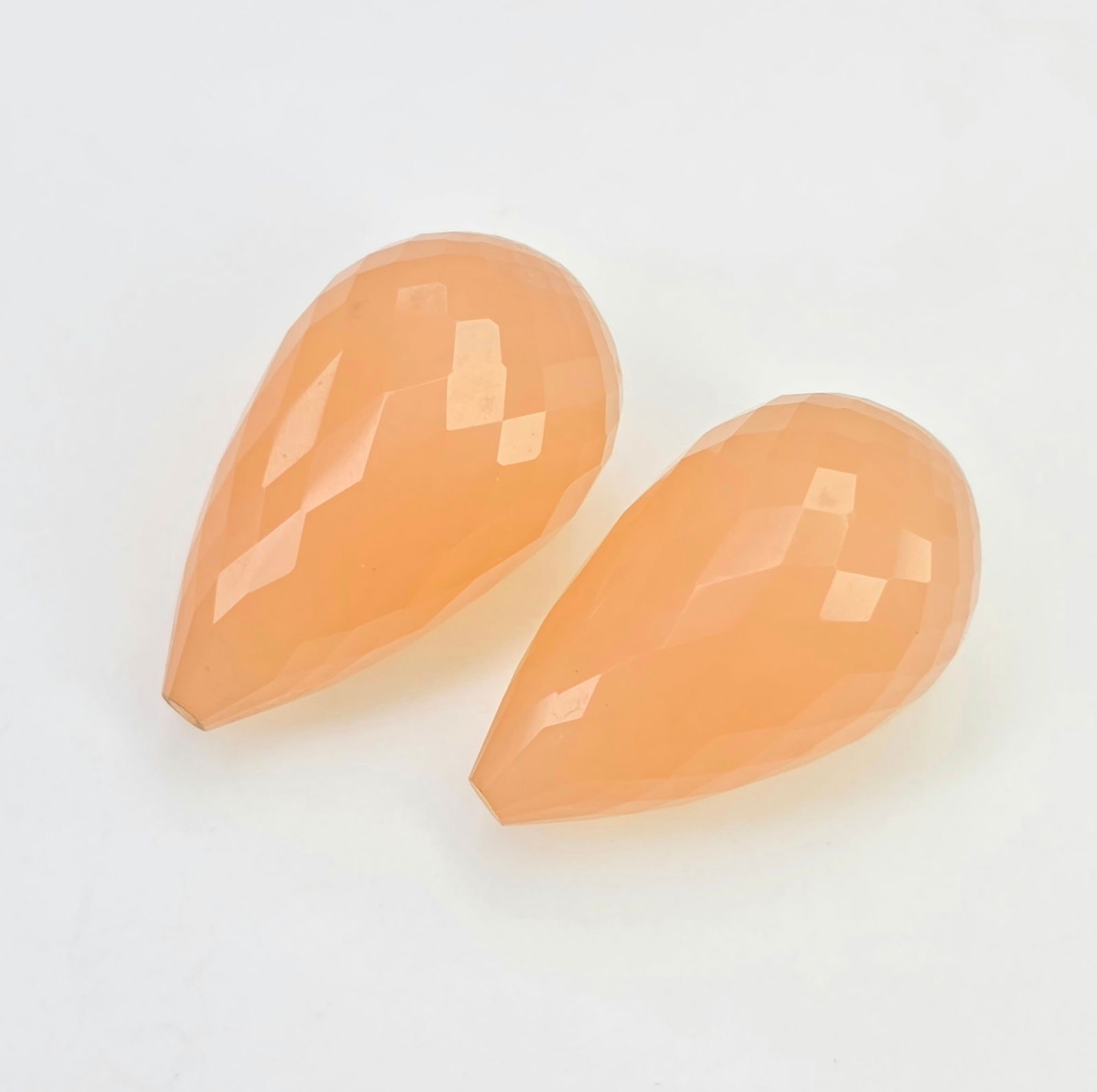 35 ct Natural Rose Quartz Pear Drops Pair: Gemstones: Natural Rose Quartz /Carat Weights: 35 ct /Size or Dimensions: 21 X 12 mm /Treatment: No