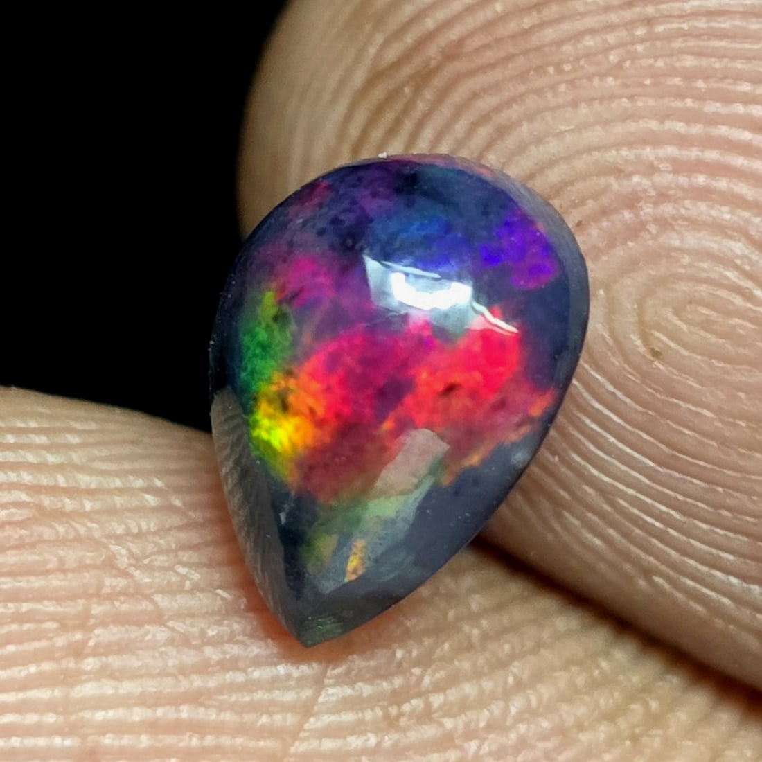 1.20 Ct "Play Of Colors" Natural Black Opal: Gemstones: Natural Black Fire Opal /Carat Weights: 1.20 ct /Size or Dimensions: 9 X 6.90 X 4.70 mmTreatment: Heated