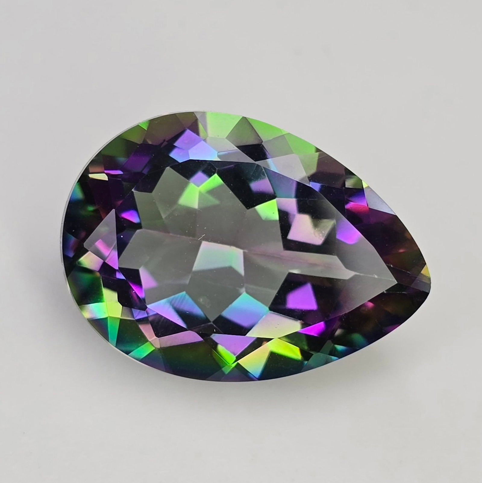 20.15 ct "Top Qulaity" Natural Rainbow Mystic Quartz: Gemstones: Natural Mystic Quartz /Carat Weights: 20.15 ct /Size or Dimensions: 22.30 X 16 X 10.50 mm /Treatment: Coated