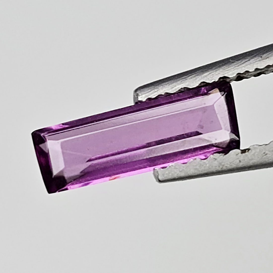 0.53 Ct Natural Rhodolite Garnet: Gemstones: Rhodolite Garnet /Carat Weights: 0.53 ct /Size or Dimensions: 8.50 X 3 X 1.80 mm