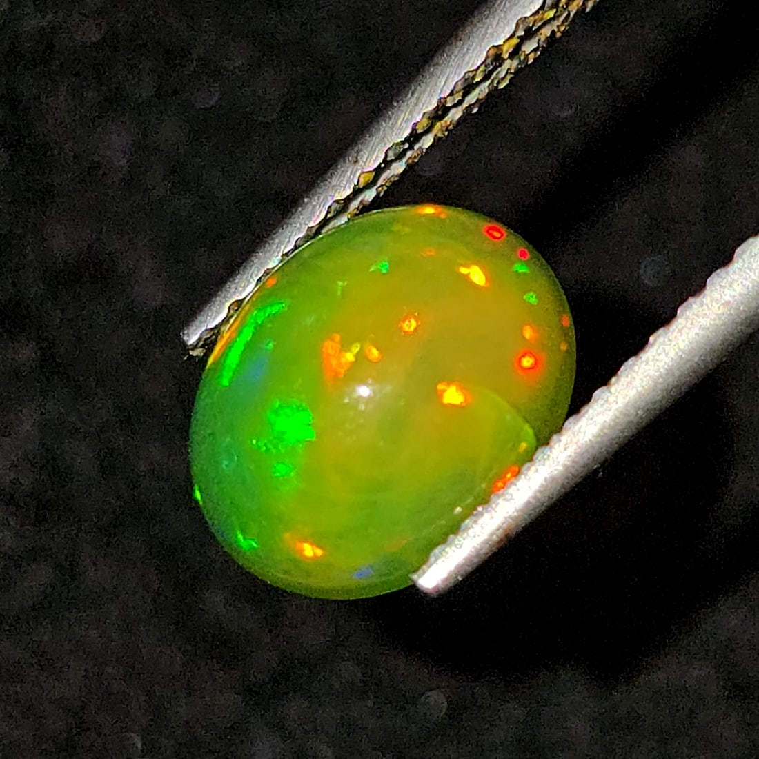 1.52 Ct Natural Green Fire Opal: Gemstones: Natural Green Fire Opal /Carat Weights: 1.52 ct /Size or Dimensions: 9 X 7 mm /Treatment: Coated