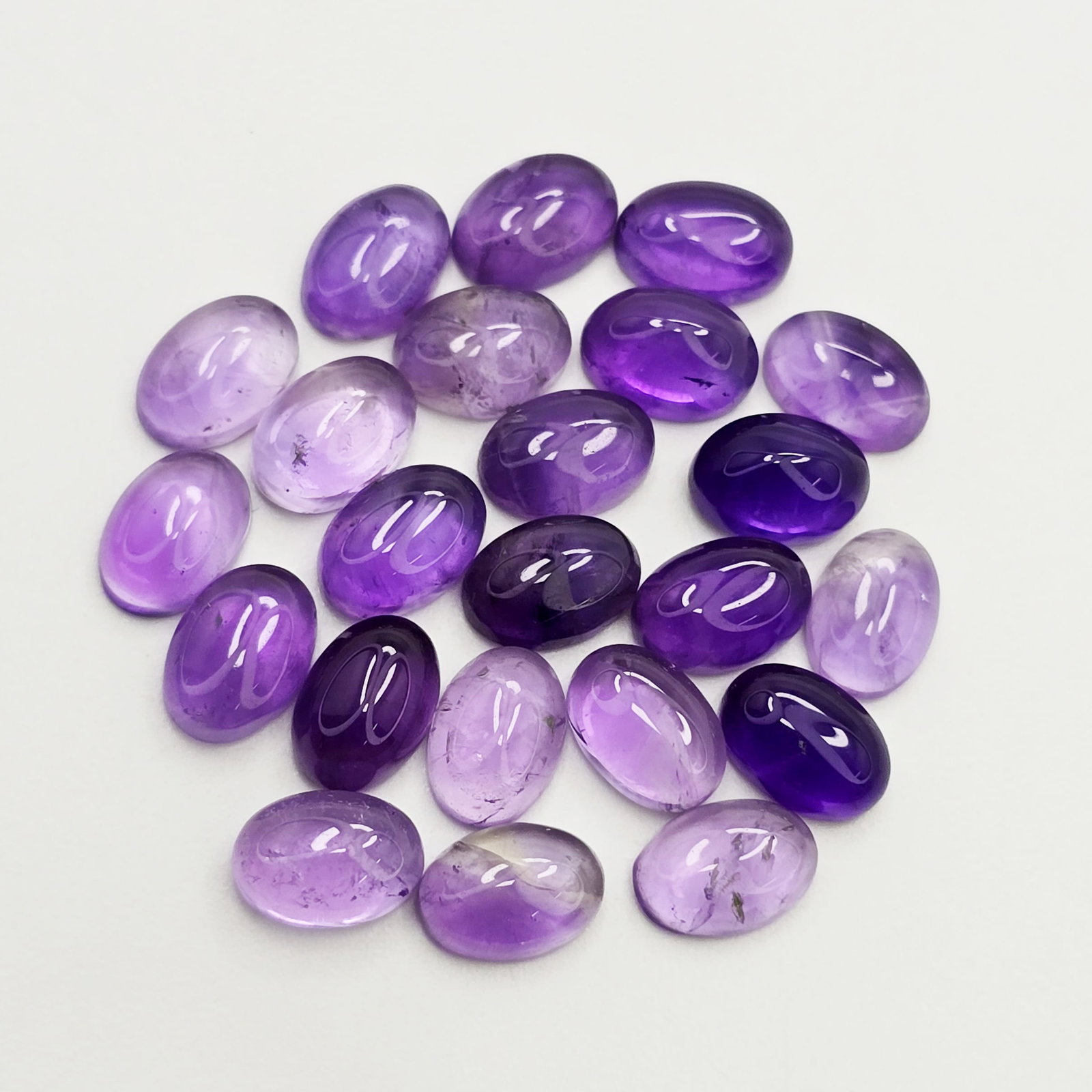 20.36 ct Natural African Amethyst Cab Oval Set: Gemstones: Natural African Amethyst /Carat Weights: 20.36 ct /Size or Dimensions: 5 X 7 mm /Origin : Africa