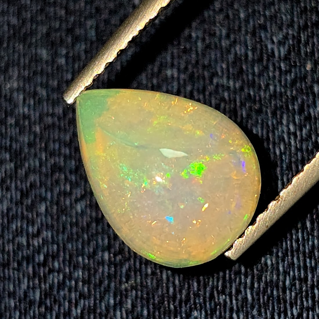 1.64 Ct Natural Ethiopian Fire Opal: Gemstones: Natural Fire Opal /Carat Weights: 1.64 ct /Size or Dimensions: 10.80 X 8 X 4.70 mm /Treatment: No