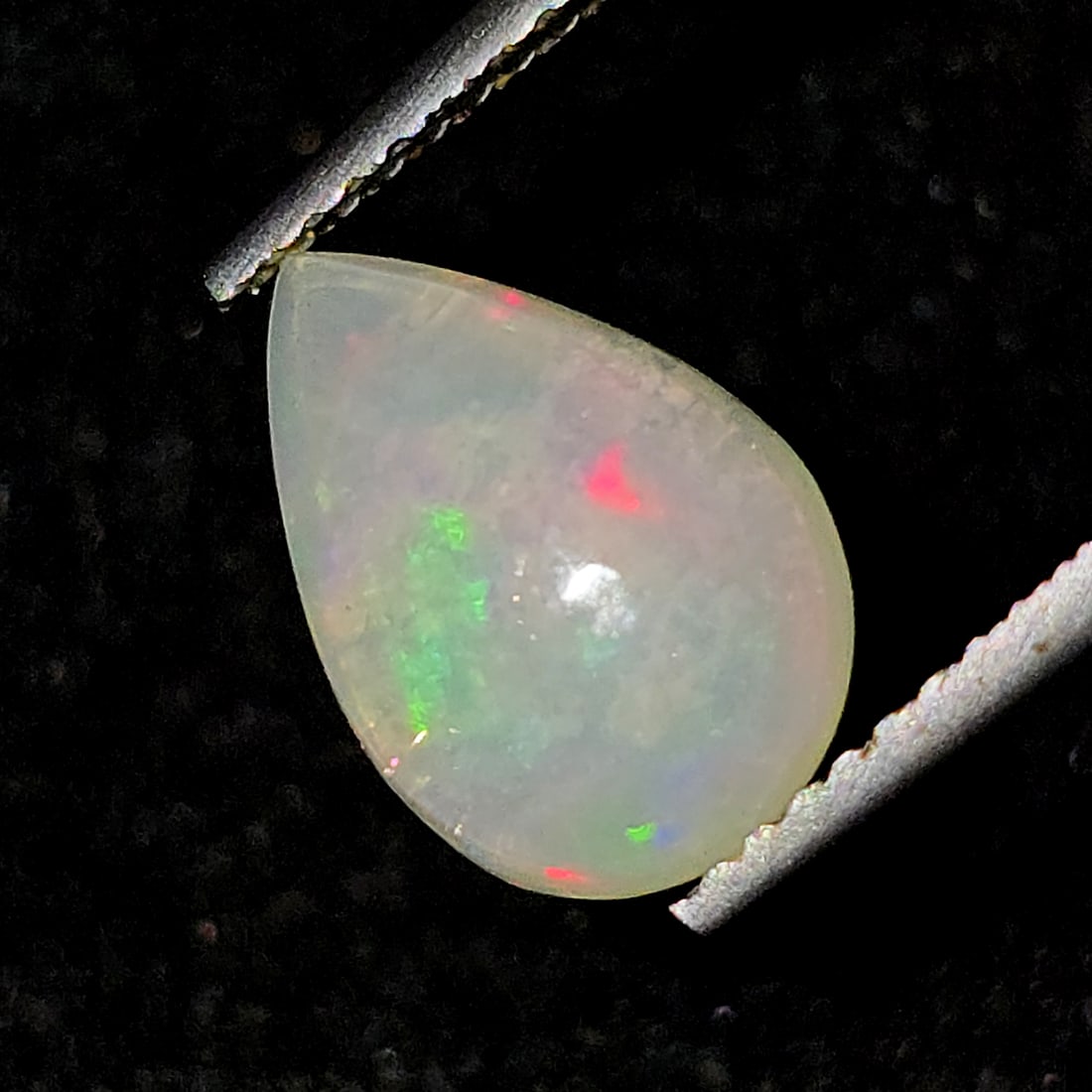 1.50 Ct Natural Ethiopian Fire Opal: Gemstones: Natural Fire Opal /Carat Weights: 1.50 ct /Size or Dimensions: 11.30 X 7.70 X 4.10 mm /Treatment: No
