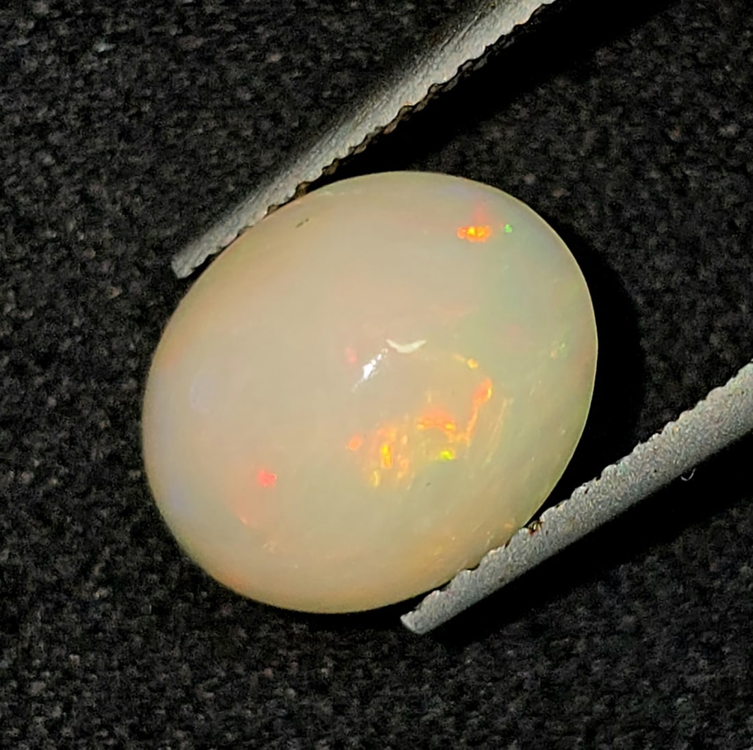 2.23 Ct Natural Ethiopian Fire Opal: Gemstones: Natural Fire Opal /Carat Weights: 2.23 ct /Size or Dimensions: 10.90 X 9 X 5.50 mm /Treatment: No